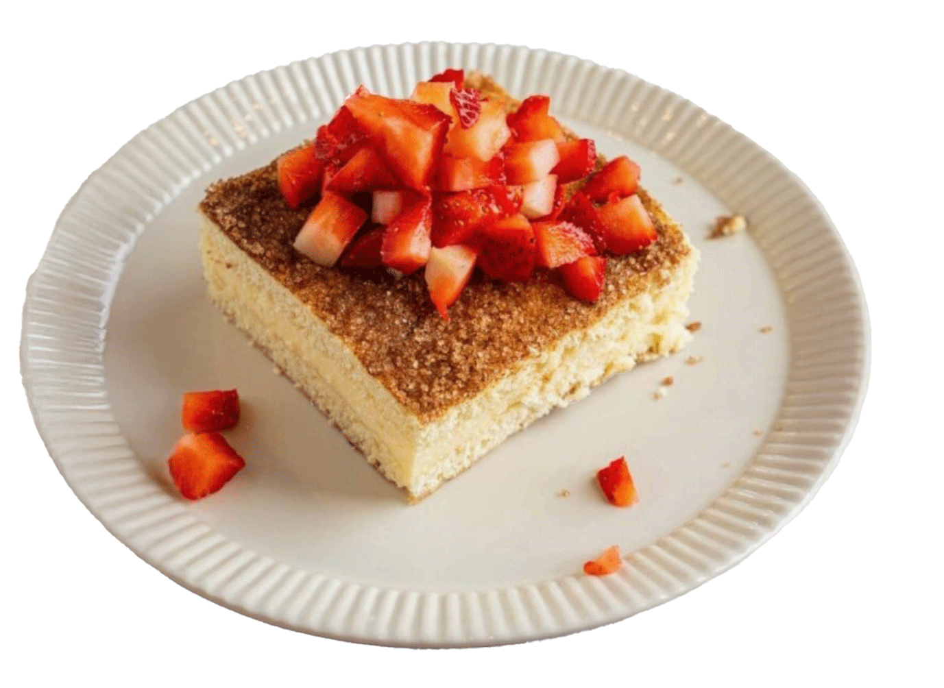 Churro cheesecake square with cinnamon sugar and creamy filling