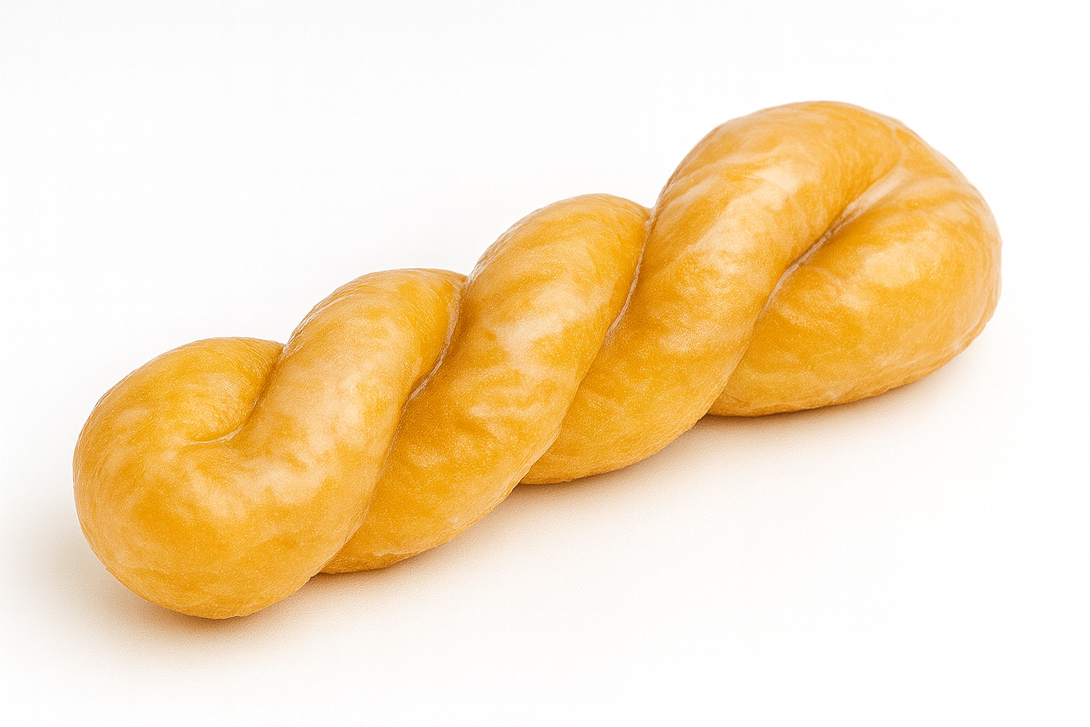 Glazed twist donut made from braided yeast dough on a white background